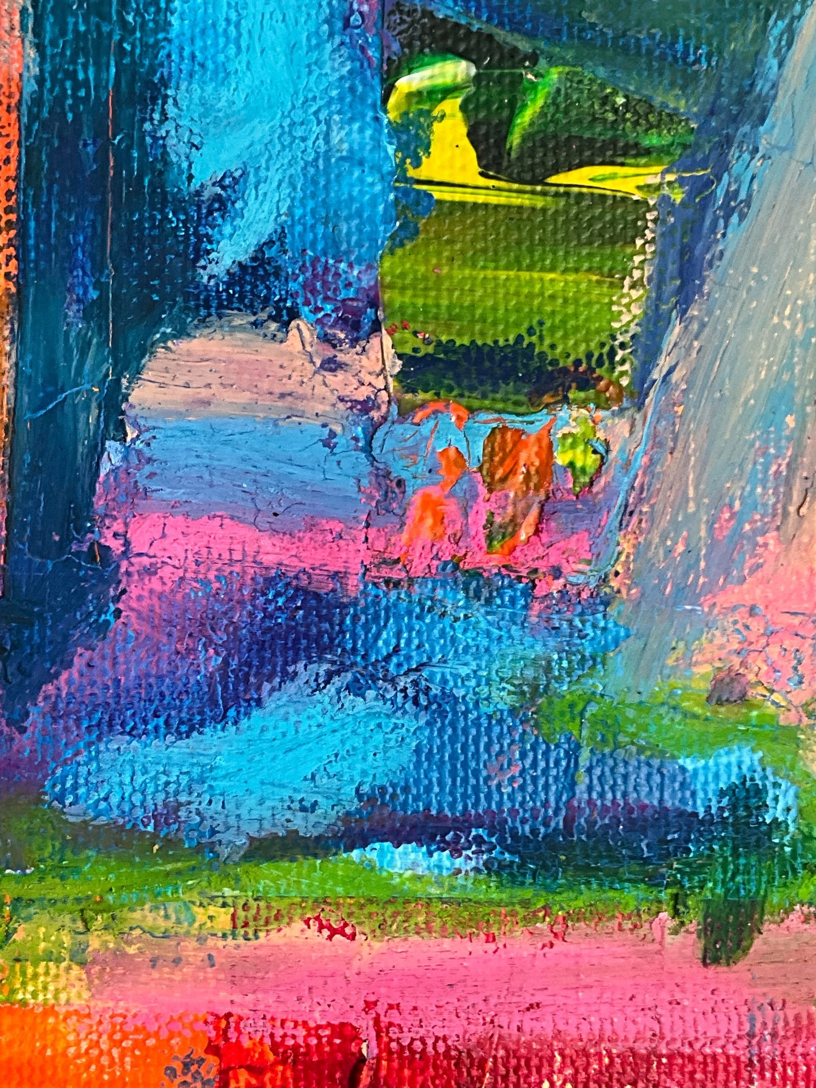 Close-up of a hand-painted abstract canvas in layered blues, greens, pinks and warm tones